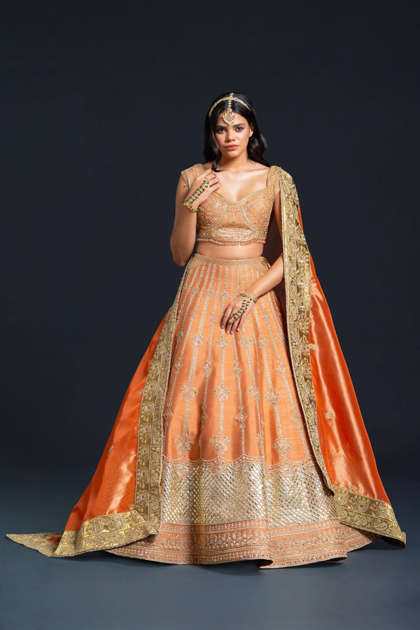 Orange Raw Silk Bridal Lehenga with Dabka and Sequin Embroidery for Reception Wear by Aahana's by Nidhi Mehra