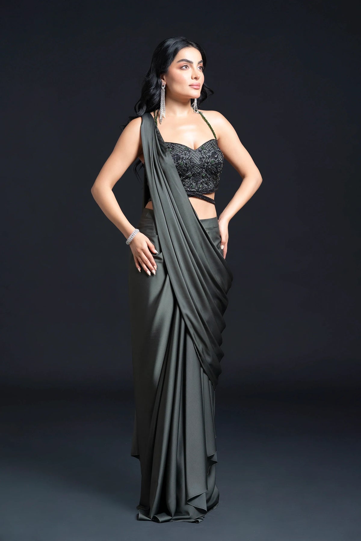 Dark Green Drape Saree with Sequin Embellishment for Indo-Western Occasion Wear by Nidhi Mehra Couture