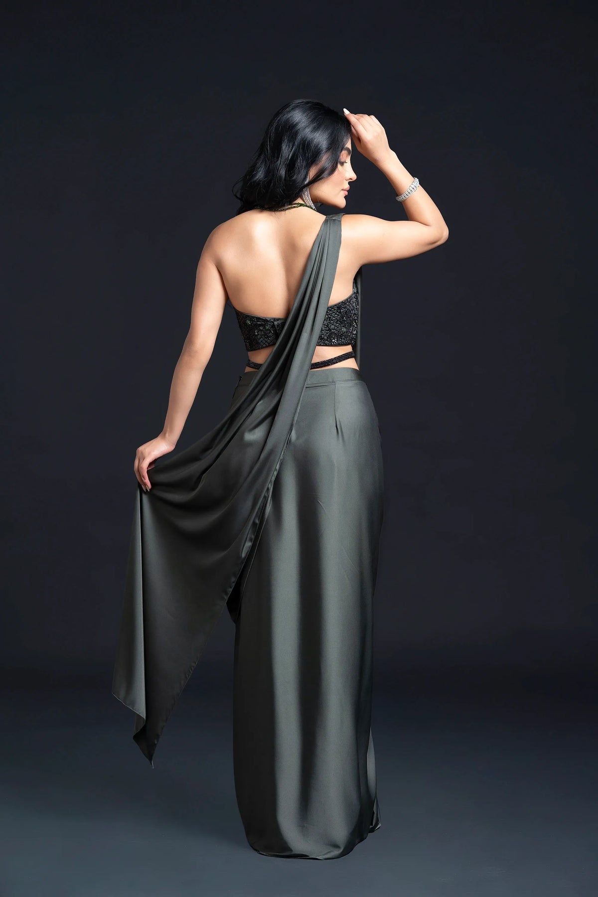 Dark Green Drape Saree with Sequin Embellishment for Indo-Western Occasion Wear by Nidhi Mehra Couture