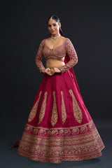 Maroon Bridal Lehenga with Dabka, Pearl Work and Sequin Embroidery for Reception Wear by Aahana's by Nidhi Mehra