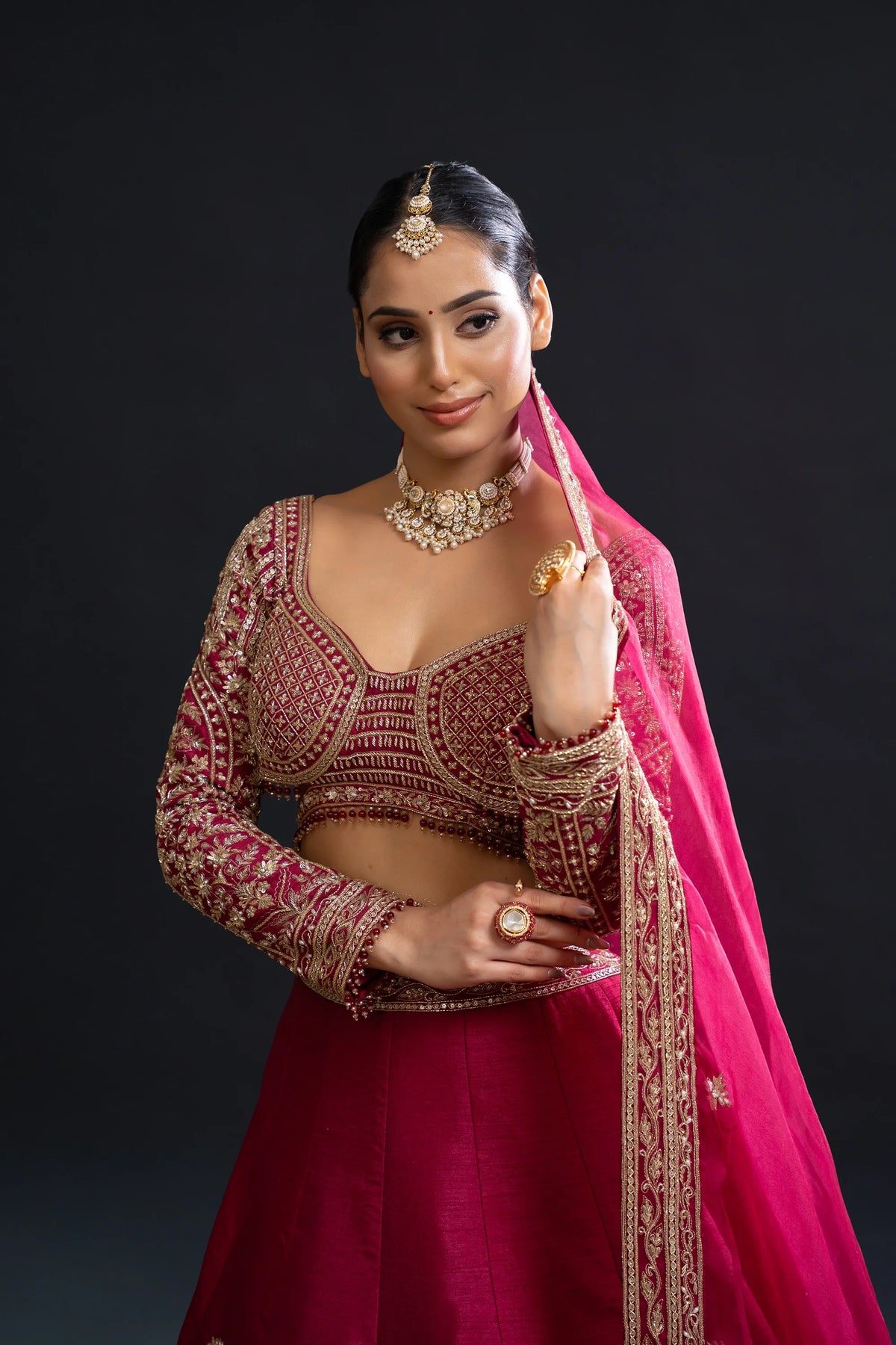 Maroon Bridal Lehenga with Dabka, Pearl Work and Sequin Embroidery for Reception Wear by Aahana's by Nidhi Mehra