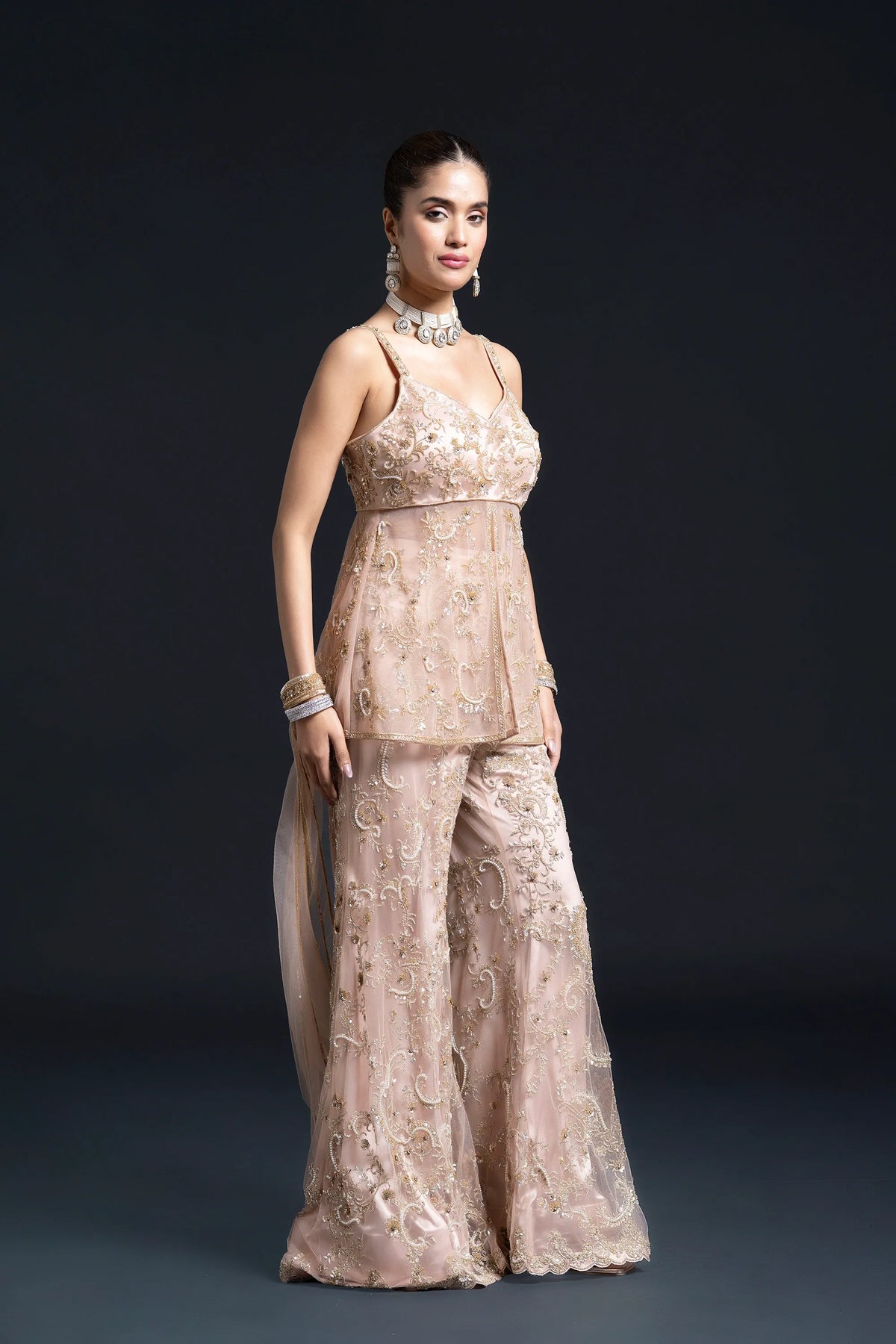 Peach Pink Bridal Sharara Set with Dabka and Sequin Embroidery for Sangeet and Reception Wear by Aahana's by Nidhi Mehra