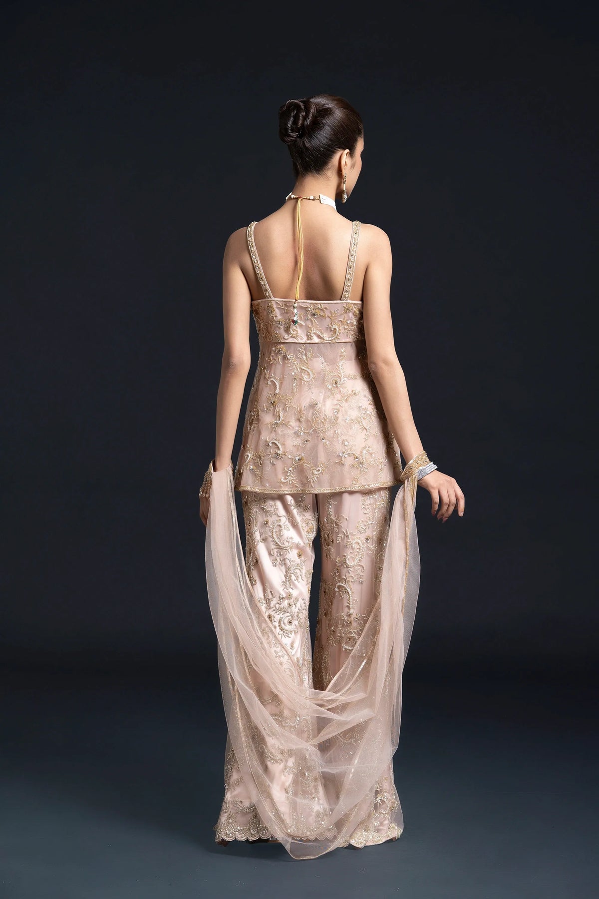 Peach Pink Bridal Sharara Set with Dabka and Sequin Embroidery for Sangeet and Reception Wear by Aahana's by Nidhi Mehra