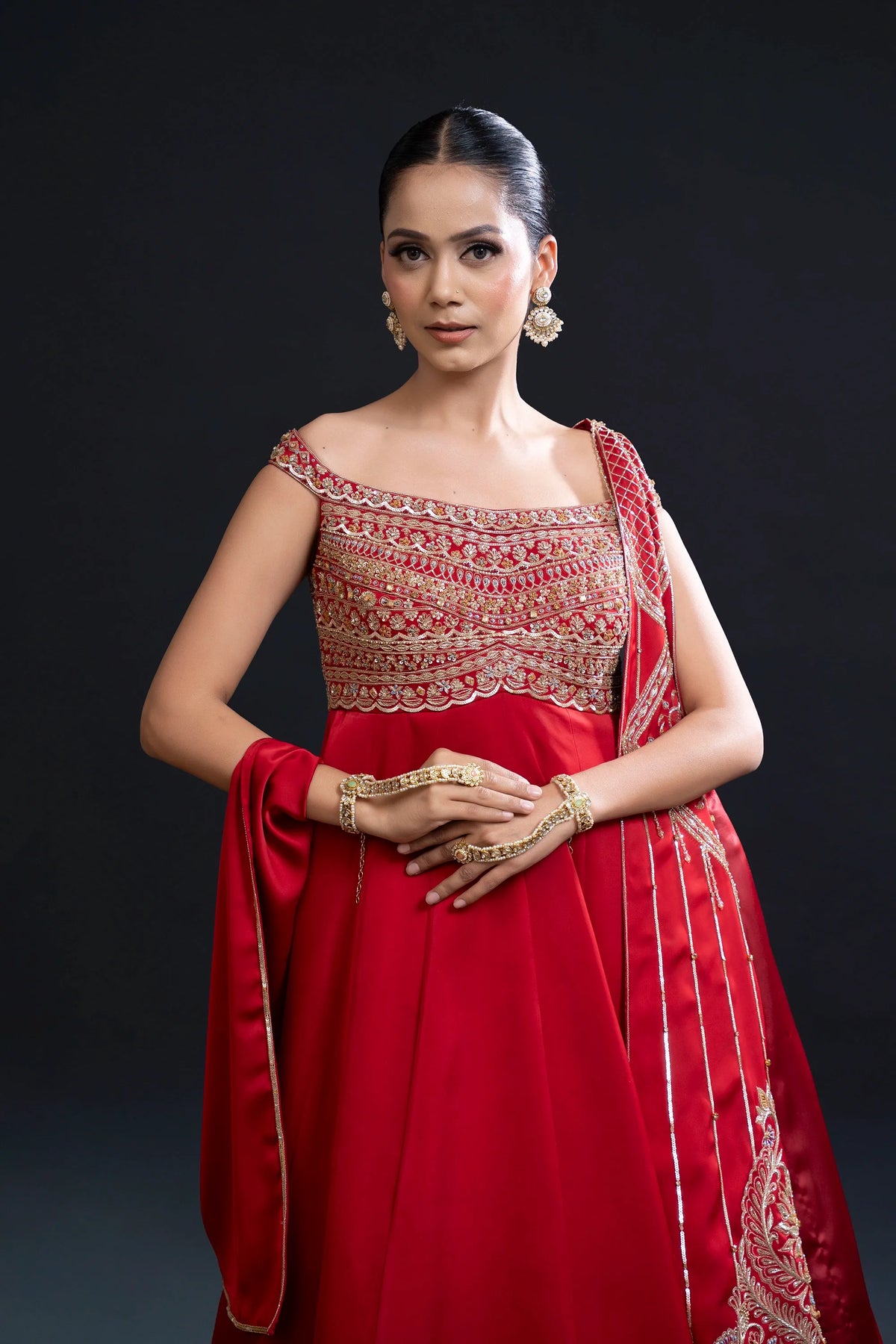 Red Bridal Anarkali Set with Mirror Work and Dabka Embroidery for Sangeet and Reception Wear by Aahana's by Nidhi Mehra