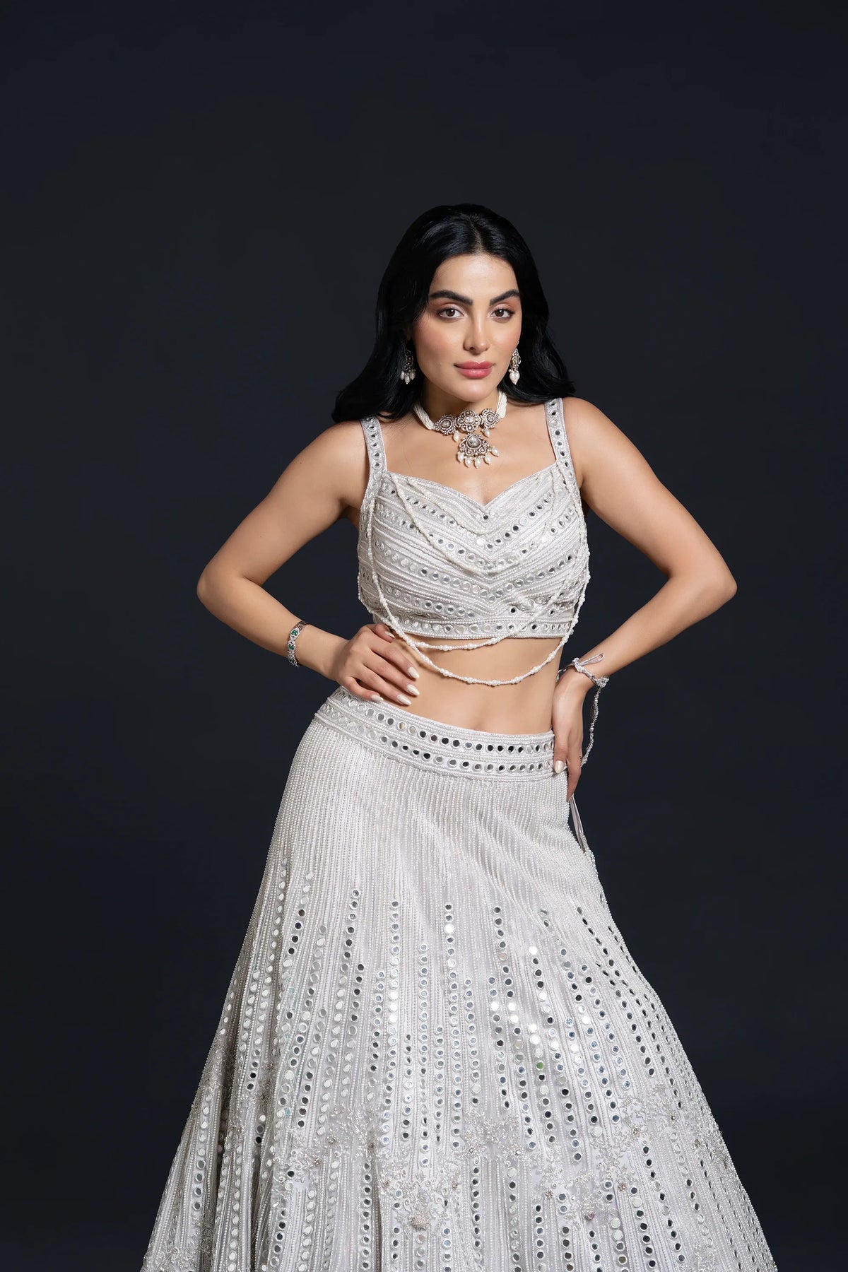 Ivory Bridal Lehenga Set with Mirror Work and Pearl Work Embroidery for Reception Wear by Aahana's by Nidhi Mehra