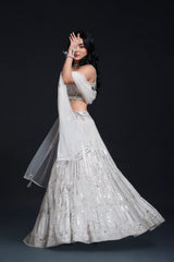 Ivory Bridal Lehenga Set with Mirror Work and Pearl Work Embroidery for Reception Wear by Aahana's by Nidhi Mehra
