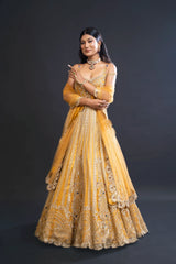 Mustard Yellow Bridal Anarkali Set with Dabka and Sequin Embroidery for Sangeet and Reception Wear by Aahana's by Nidhi Mehra