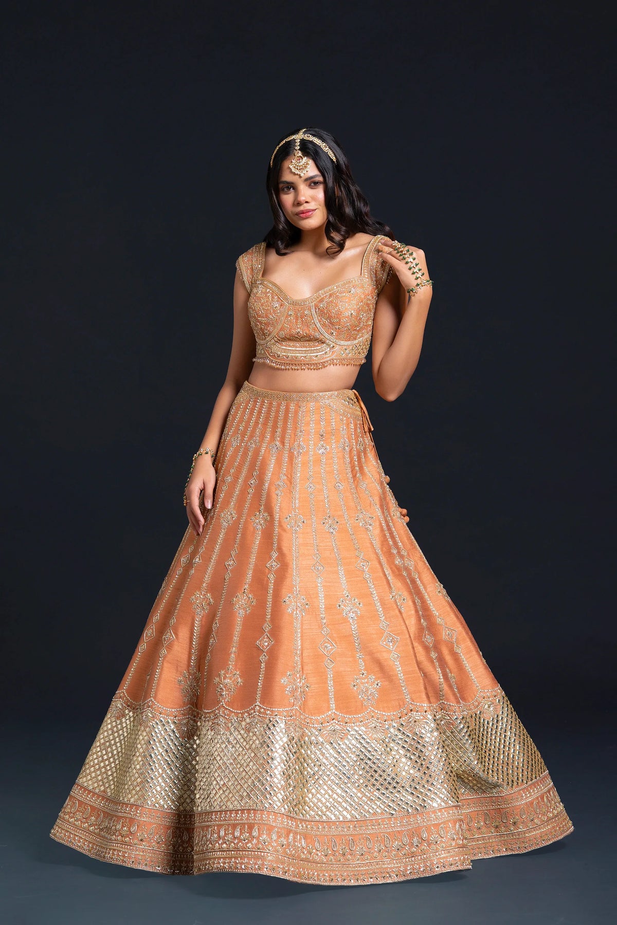 Orange Raw Silk Bridal Lehenga with Dabka and Sequin Embroidery for Reception Wear by Aahana's by Nidhi Mehra