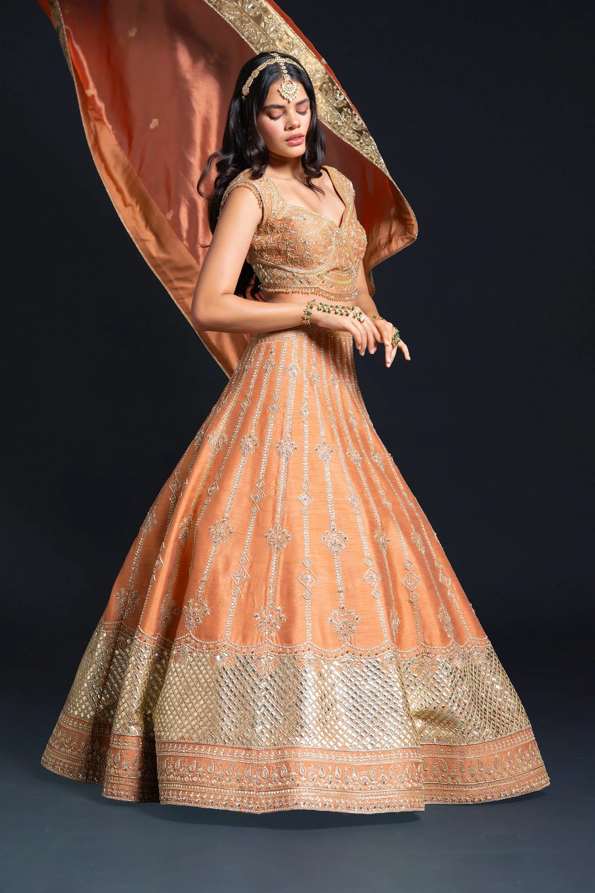 Orange Raw Silk Bridal Lehenga with Dabka and Sequin Embroidery for Reception Wear by Aahana's by Nidhi Mehra