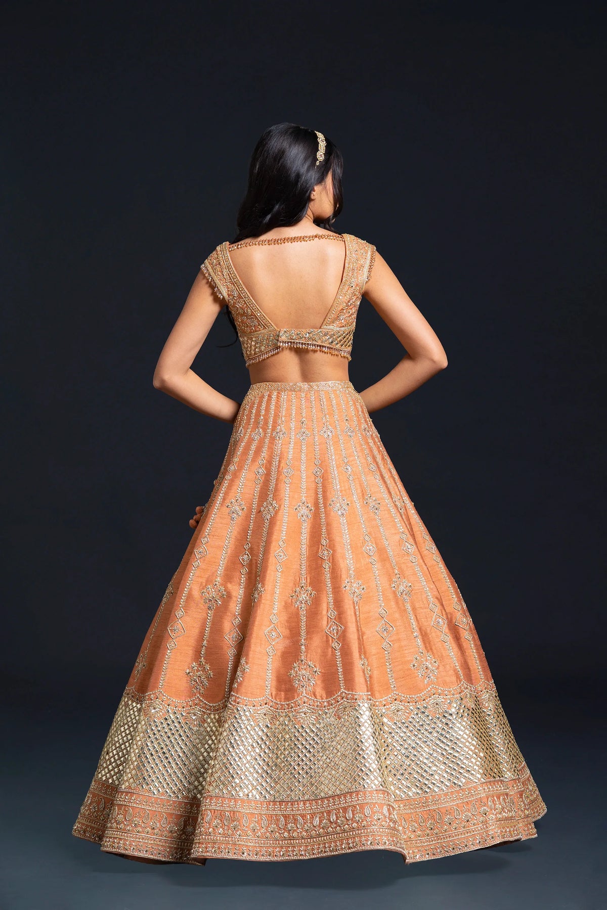 Orange Raw Silk Bridal Lehenga with Dabka and Sequin Embroidery for Reception Wear by Aahana's by Nidhi Mehra