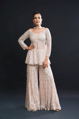 Blush Pink Bridal Sharara Set with Pearl Work and Sequin Embroidery for Sangeet and Reception Wear by Aahana's by Nidhi Mehra