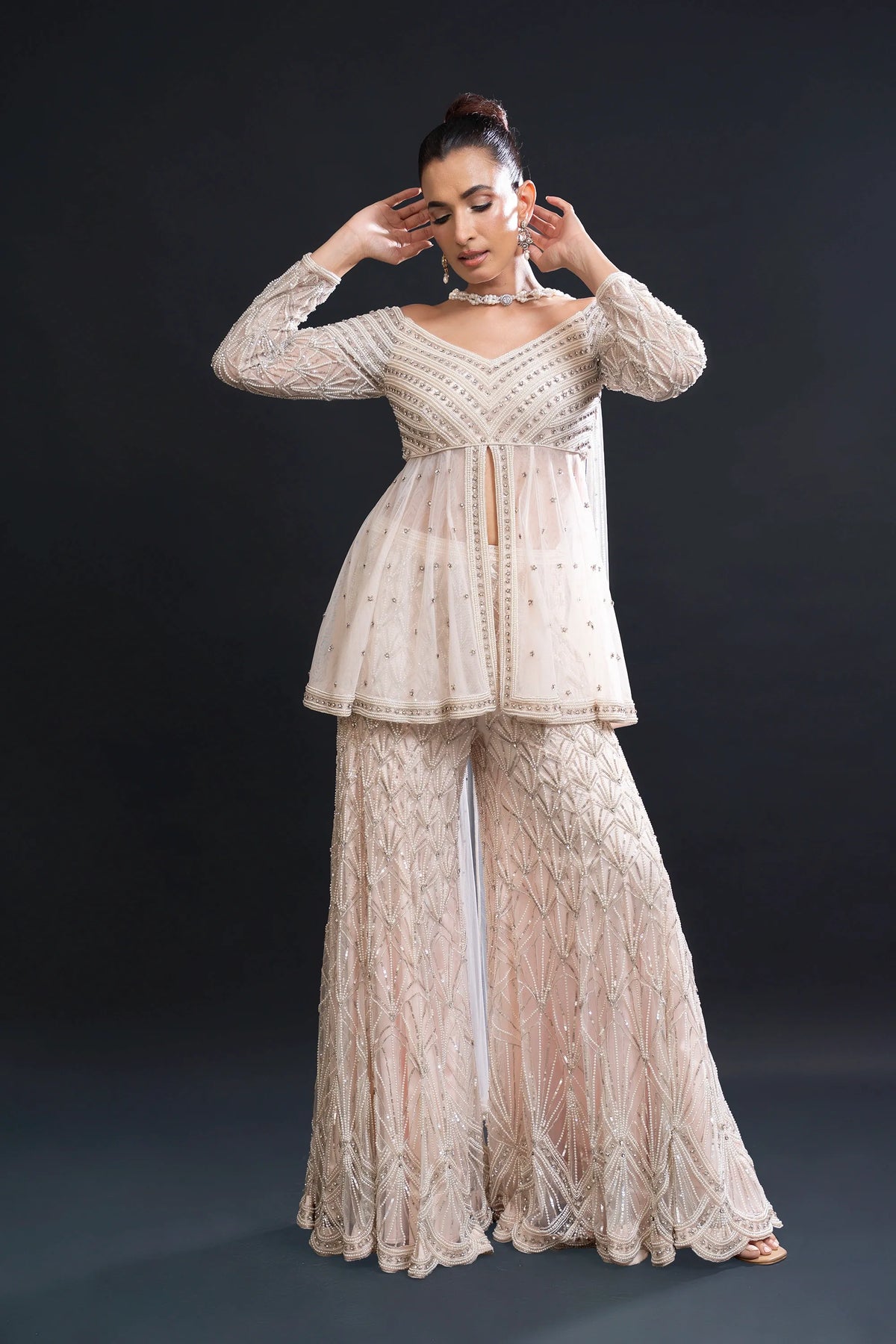 Blush Pink Bridal Sharara Set with Pearl Work and Sequin Embroidery for Sangeet and Reception Wear by Aahana's by Nidhi Mehra