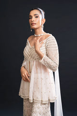 Blush Pink Bridal Sharara Set with Pearl Work and Sequin Embroidery for Sangeet and Reception Wear by Aahana's by Nidhi Mehra