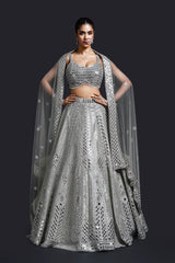 Sage green bridal lehenga with mirror work by Nidhi Mehra