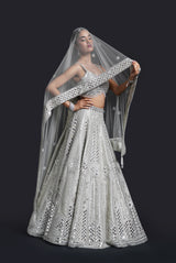 Sage green mirror work lehenga with dabka and gota patti embroidery