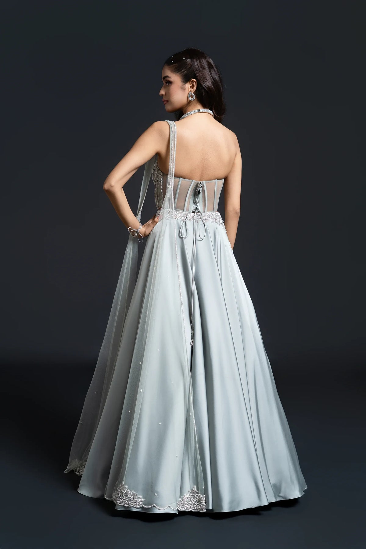 Elegant sage green occasion wear styled for an Indian wedding